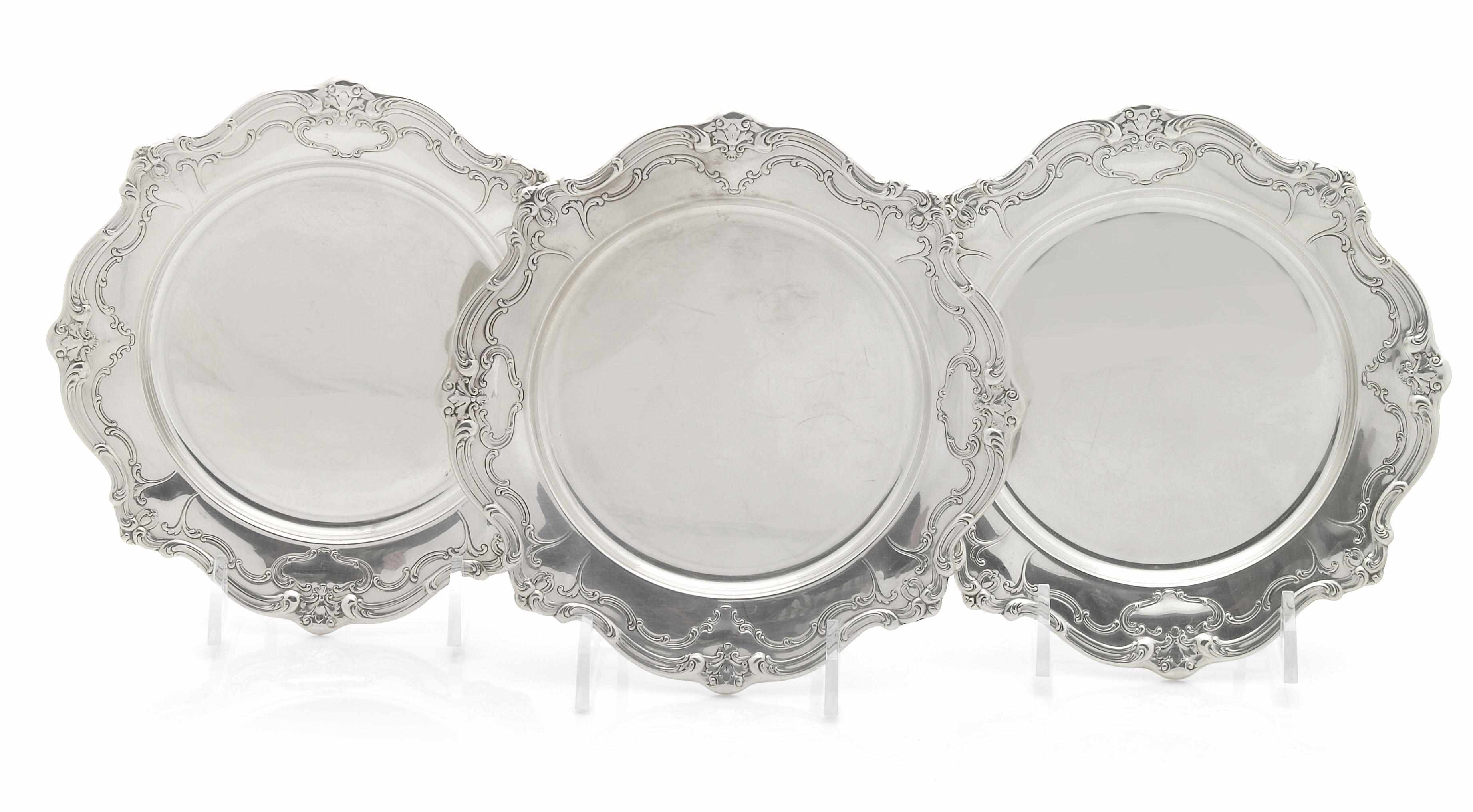 Appraisal: A sterling set of fourteen bread and butter plates Gorham