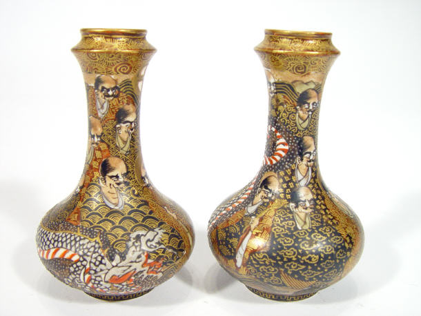 Appraisal: Pair of miniature Japanese Satsuma pottery bottle vases painted with