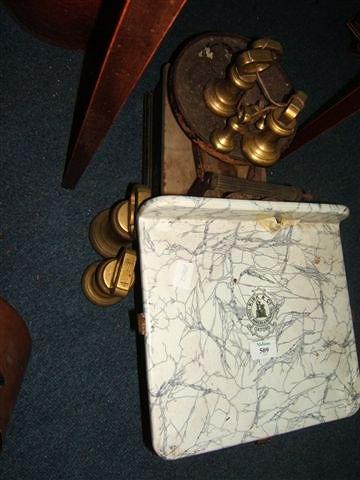 Appraisal: A set of weighing scales with a ceramic base stamped