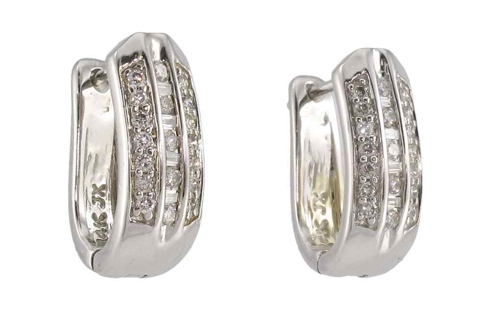 Appraisal: K GOLD AND DIAMOND HUGGIE EARRINGS White gold pierced huggie