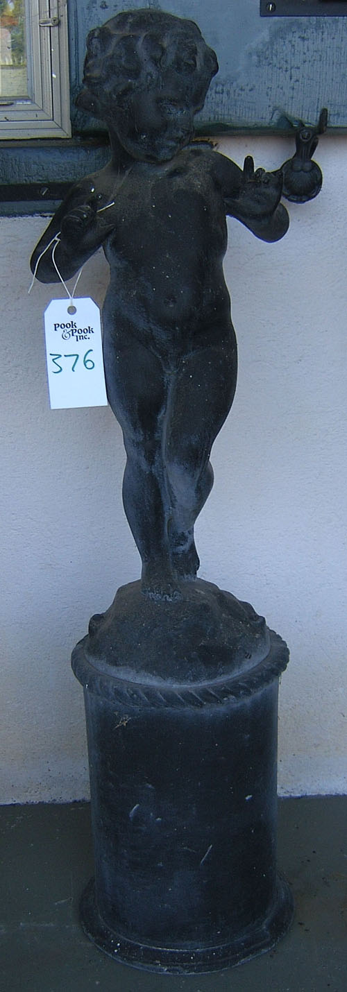 Appraisal: Lead garden statue of a putti early th c h