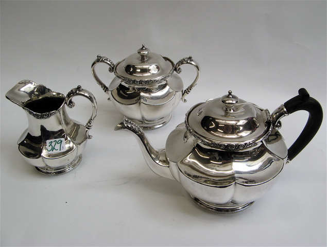 Appraisal: PAIRPOINT SILVER PLATED TEA SET pieces decorated with band of