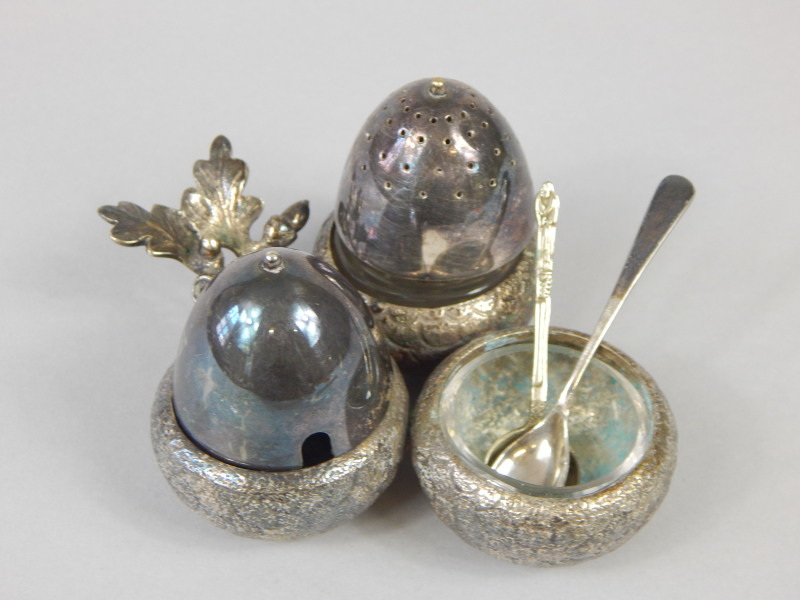 Appraisal: A Chinese white metal acorn shaped cruet in three parts