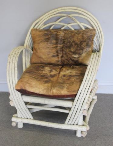 Appraisal: Adirondack Arm Chair with Hide CushionsFrom a Lake George NY