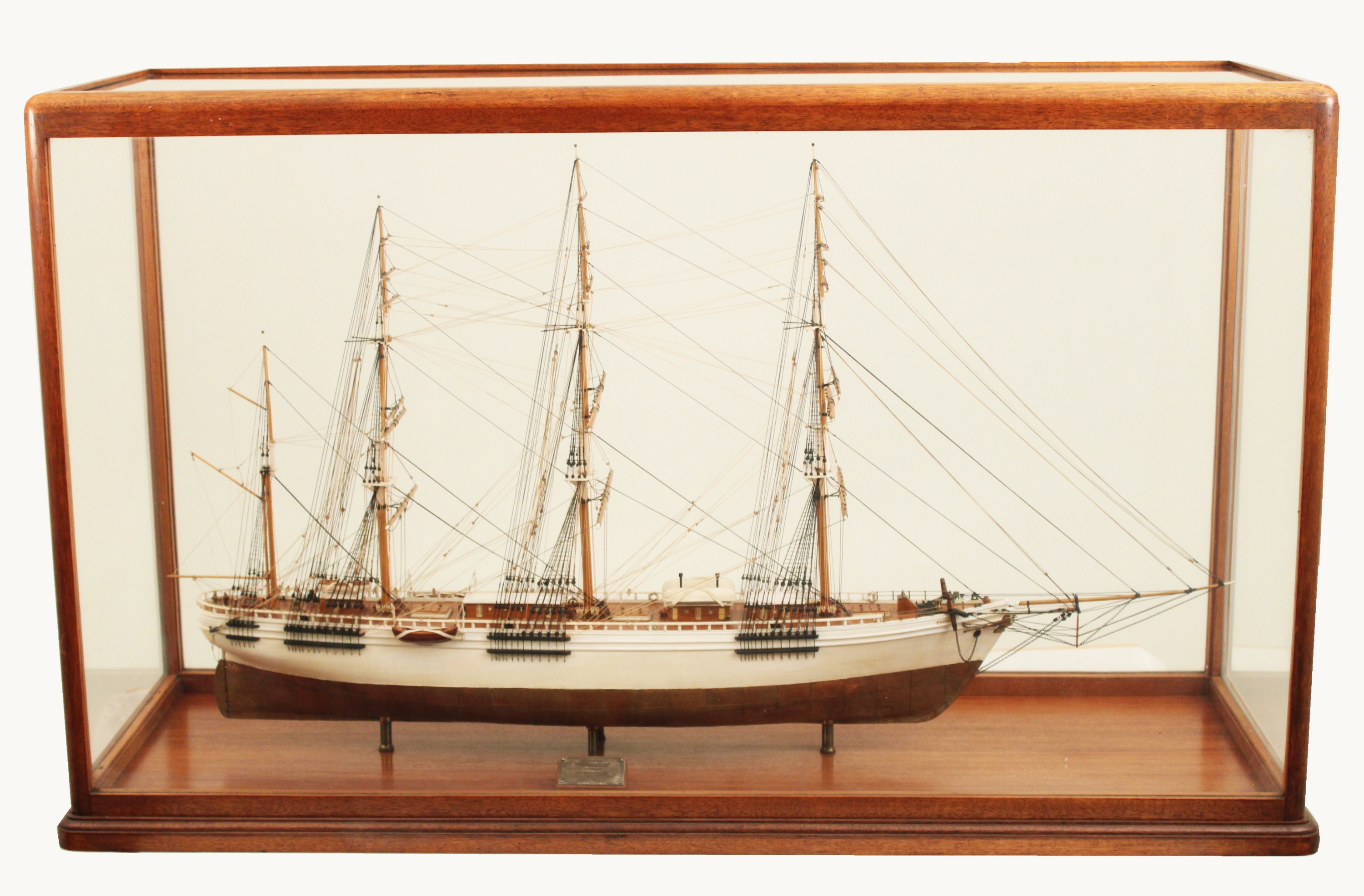 Appraisal: CUSTOM MAHOGANY CASED WOODEN SHIP Custom mahogany cased handmade wooden