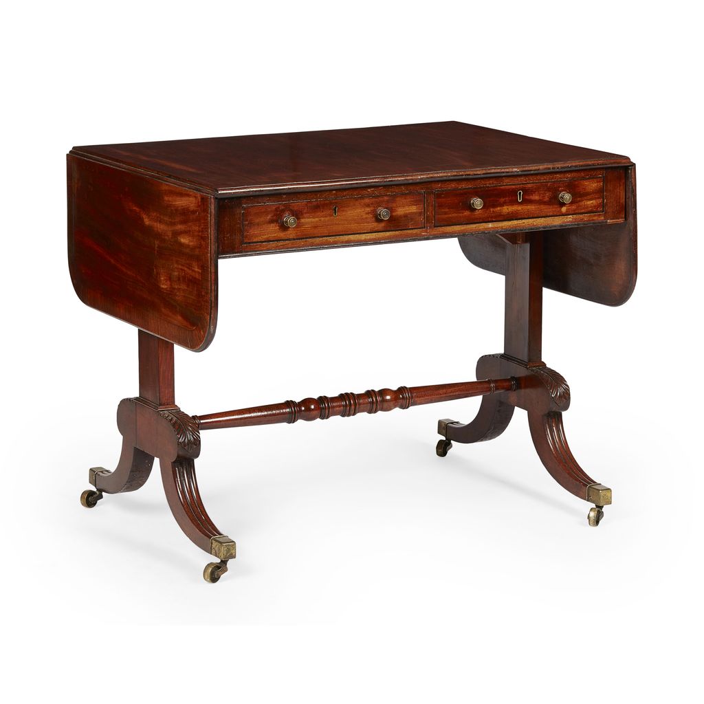 Appraisal: REGENCY MAHOGANY AND ROSEWOOD SOFA TABLE CIRCA the rounded rectangular