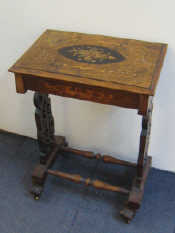 Appraisal: A Victorian inlaid walnut lady's occasional table with drawer on