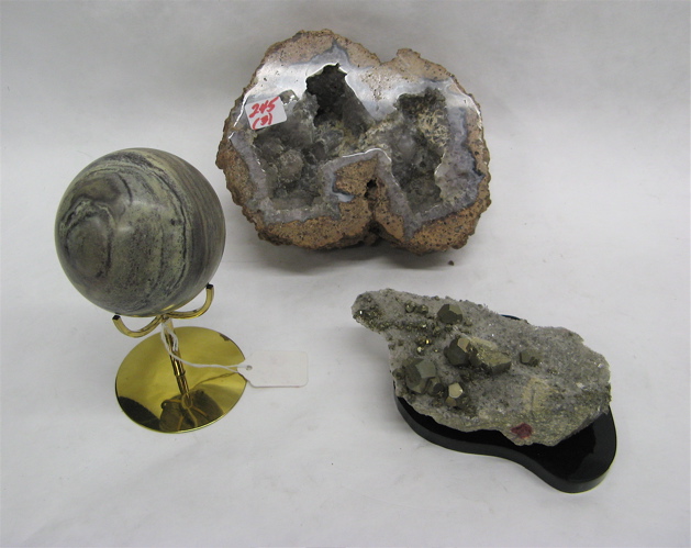 Appraisal: THREE SPECIMENS a rhodocrosite sphere in diameter pyrite and crystal