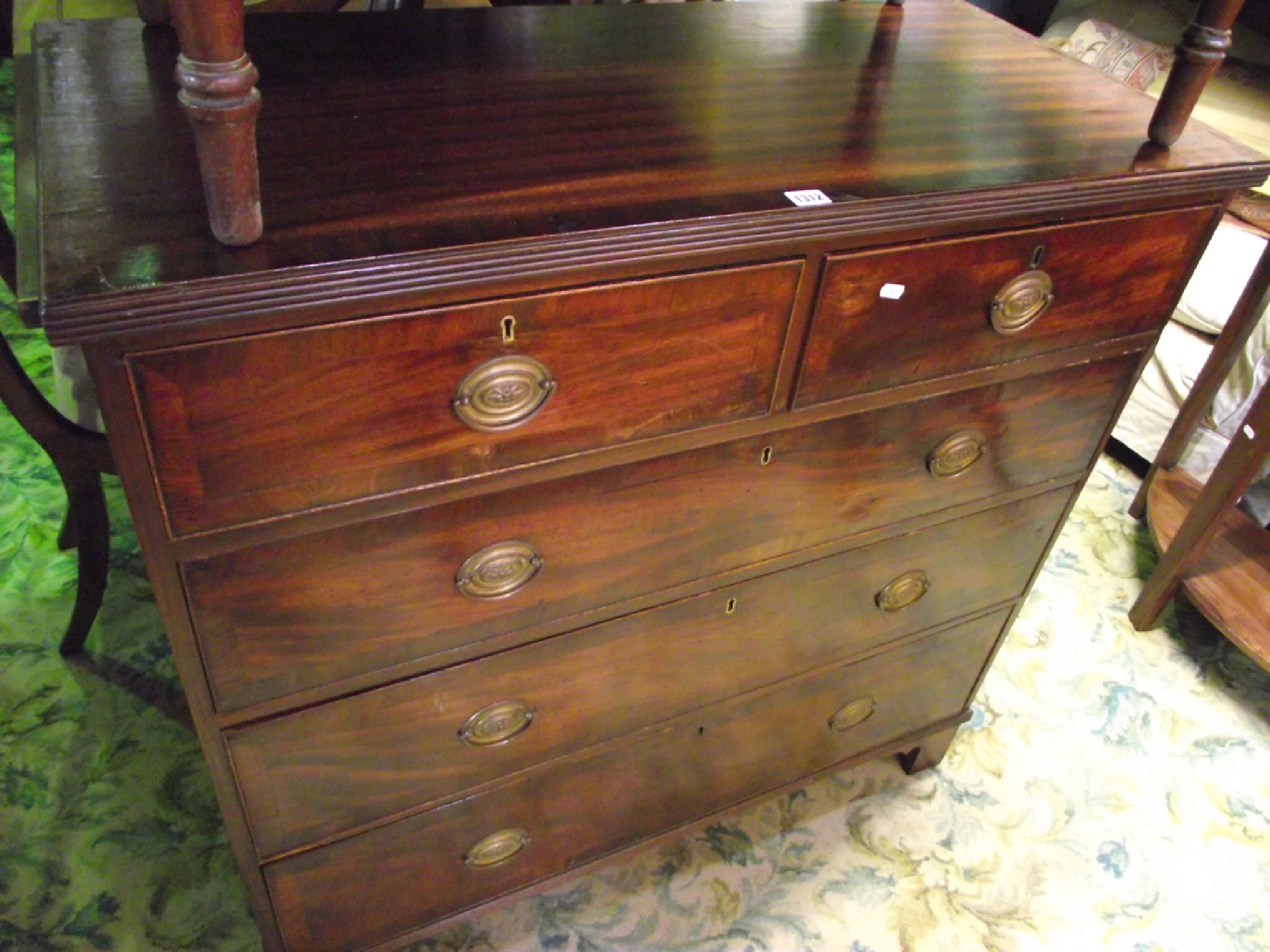 Appraisal: A Georgian mahogany bedroom chest of three long and two