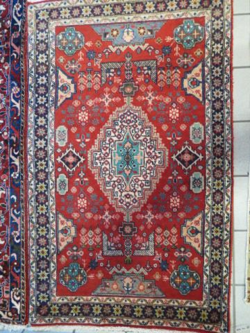 Appraisal: Tabriz Persian Handmade Rug interesting geometrics florals red field '