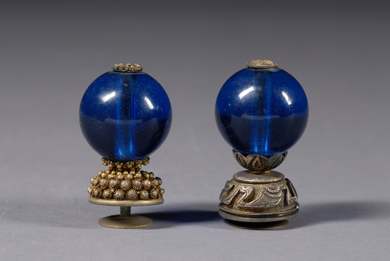 Appraisal: Two Official's Hat Buttons China th century blue glass and