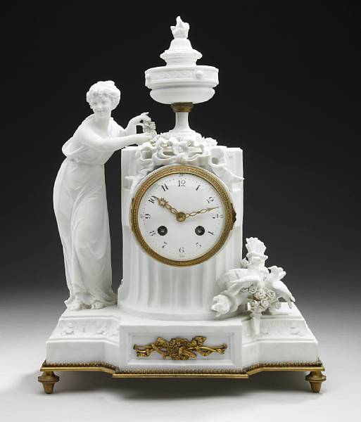 Appraisal: A French bisque porcelain mantel clock early th century Centered