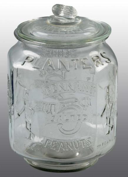 Appraisal: Glass Planters Peanut -Cent Display Jar Description Original lid with