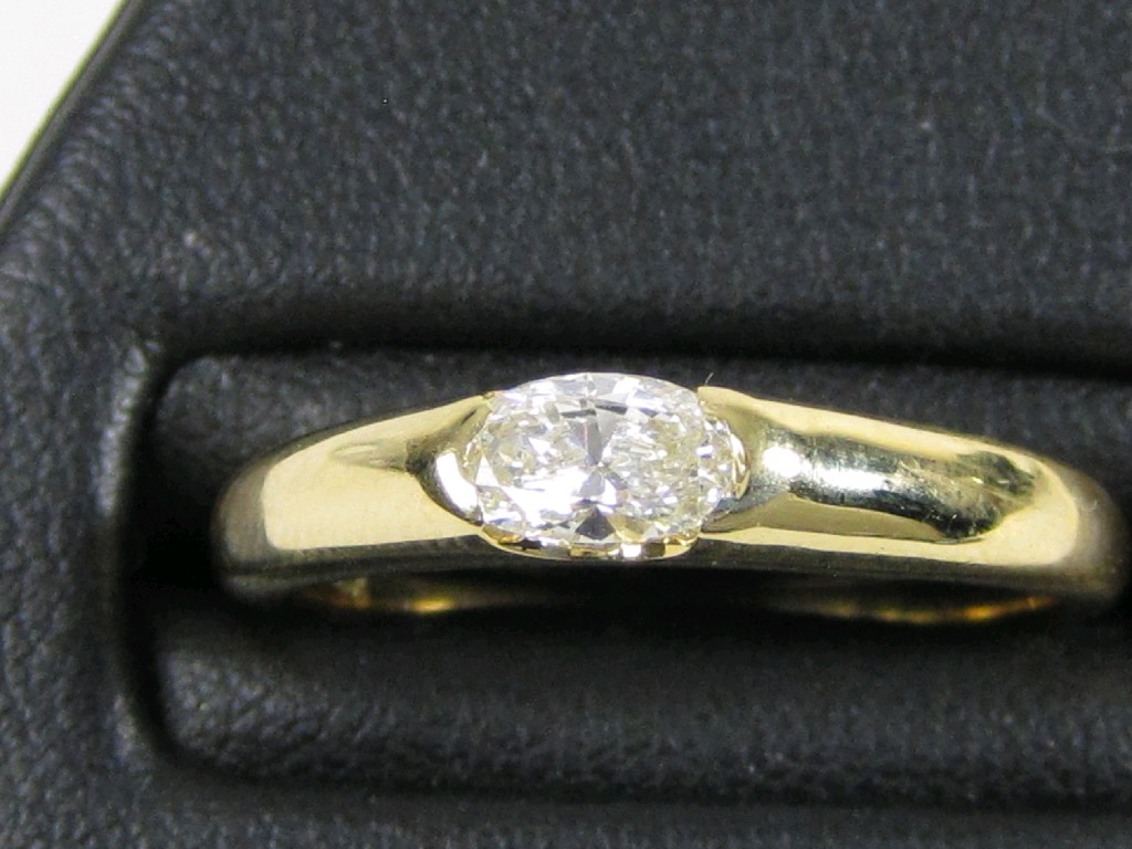 Appraisal: A Cartier Diamond single stone Ring gypsy-set oval-cut stone in