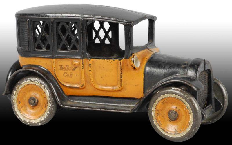 Appraisal: Cast Iron Yellow Cab Still Bank Description Made by Arcade