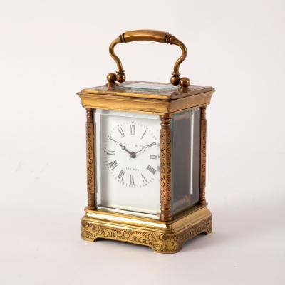 Appraisal: A small gilt brass and engraved carriage clock Elliott Son