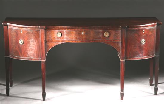 Appraisal: ENGLISH GEORGE III MAHOGANY SIDEBOARD early th century Serpentine-shaped top