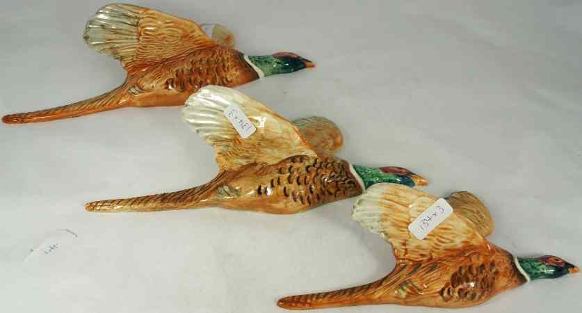 Appraisal: Beswick Set of Three Wall Plaque Pheasants - all tails