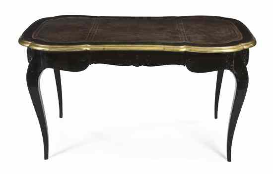 Appraisal: A Napoleon III Ebonized Bureau Plat with a shaped leather