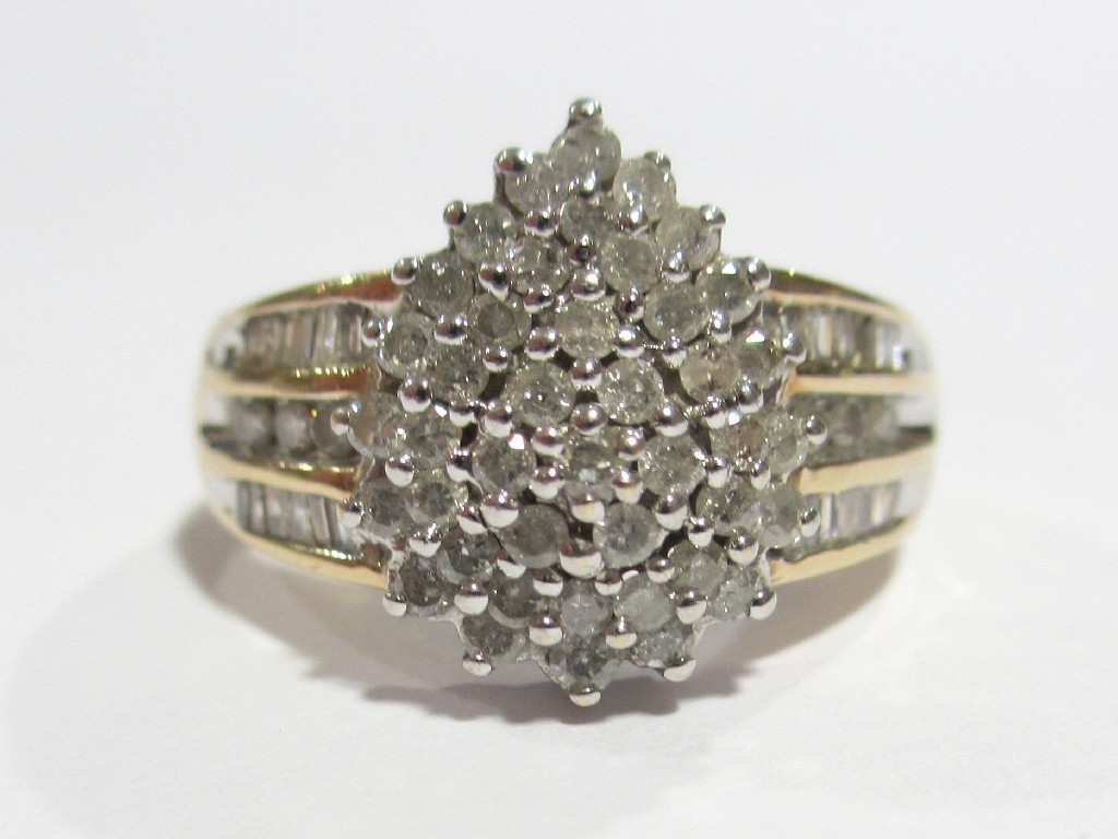 Appraisal: A nine carat gold diamond cluster ring with a pear