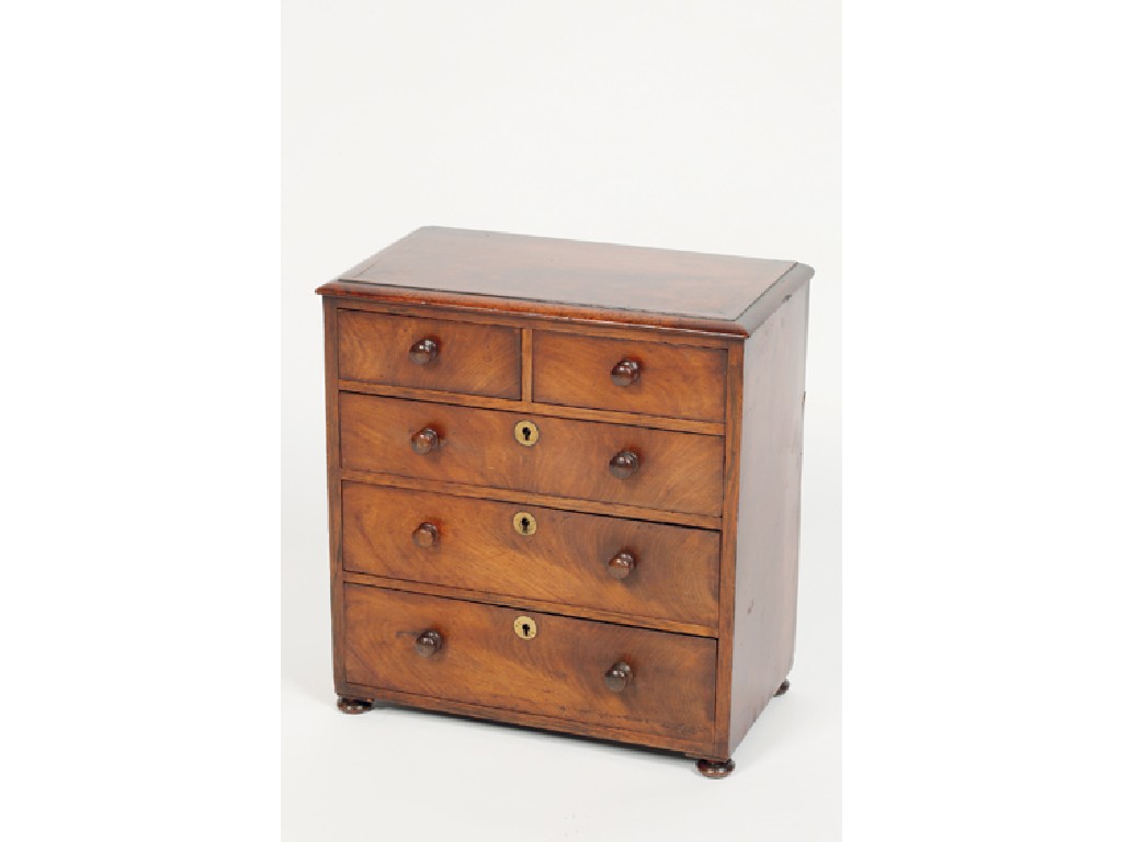 Appraisal: A REGENCY MAHOGANY MINIATURE CHEST OF DRAWERS with a rectangular