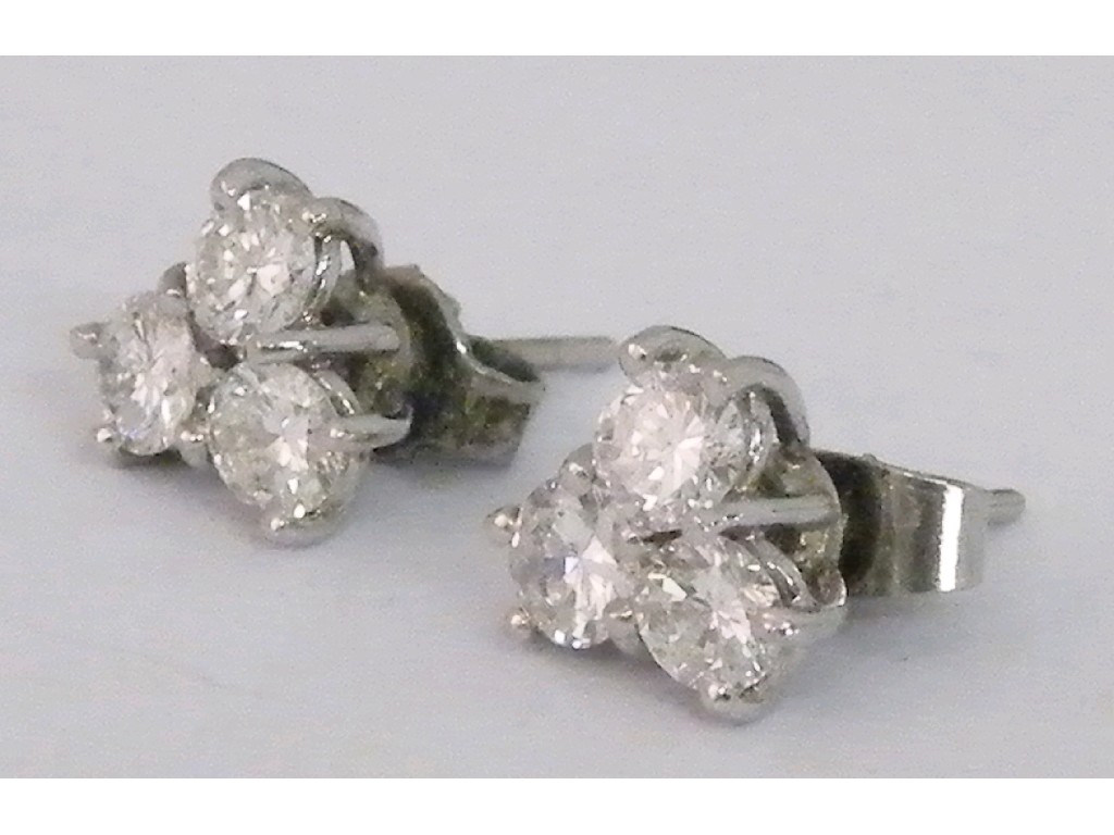 Appraisal: Pair of three stone brilliant cut diamond earrings in a