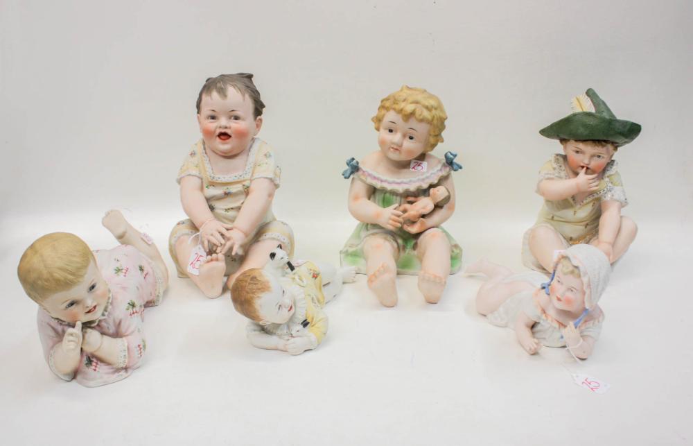 Appraisal: FIVE BISQUE PIANO BABIES including three seated figures and two