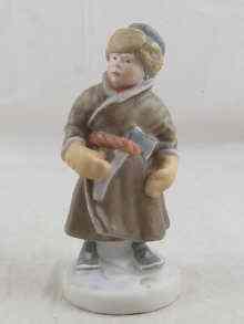 Appraisal: A Russian ceramic figure of a woodcutter cm high blue