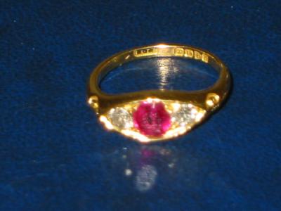 Appraisal: A RUBY AND DIAMOND THREE STONE RING the navette top