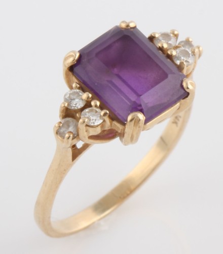 Appraisal: K one x mm emerald cut amethyst six round diamonds