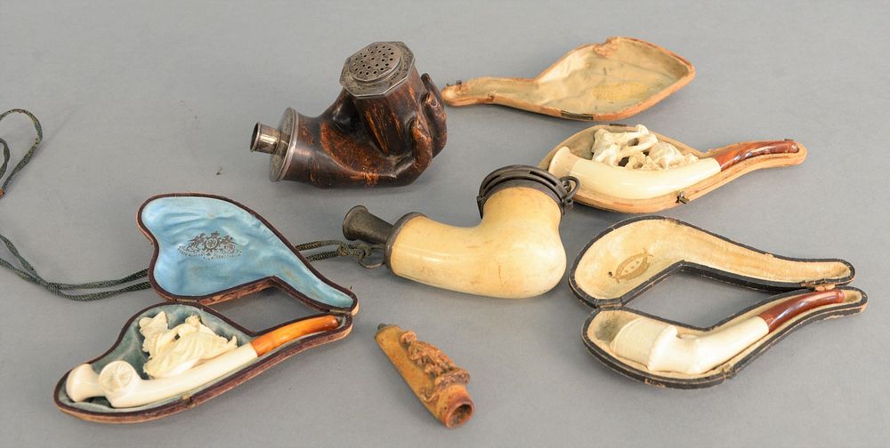 Appraisal: Six pipes Meerschaum th C carved treen pipe in the