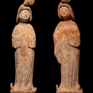 Appraisal: Two Chinese Painted Pottery Figures of Fat Ladies TANG DYNASTY