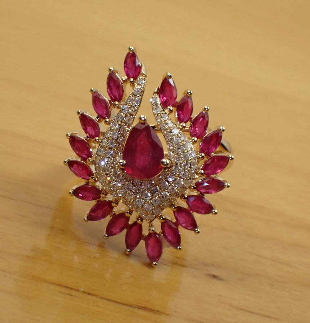 Appraisal: RUBY DIAMOND AND FOURTEEN KARAT GOLD EFFY RING with marquise-cut