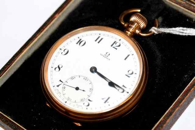 Appraisal: A CT GOLD POCKET WATCH by Omega with white enamelled