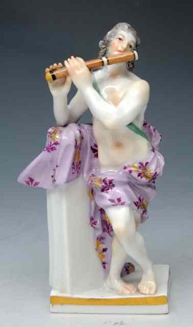 Appraisal: A MEISSEN MINIATURE FIGURE OF A CLASSICAL MUSICIAN possibly the