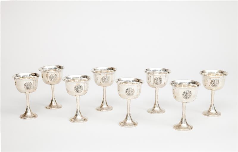 Appraisal: Set of Eight Thai Silver-Weighted Cocktails With applied Buddha medallions