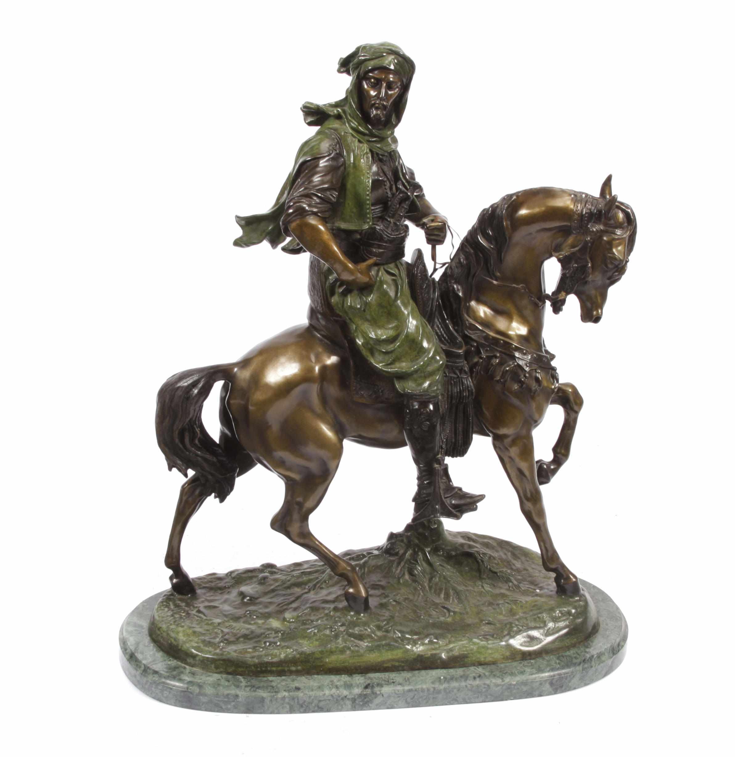 Appraisal: A patinated bronze equestrian group of an Arab on horseback