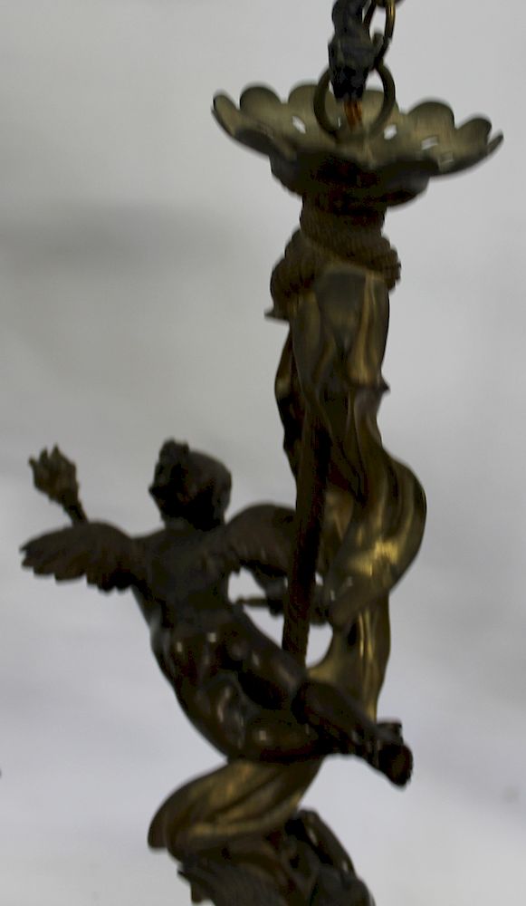 Appraisal: Fine Quality Antique Bronze Putti Form Chandelier With tassel Base