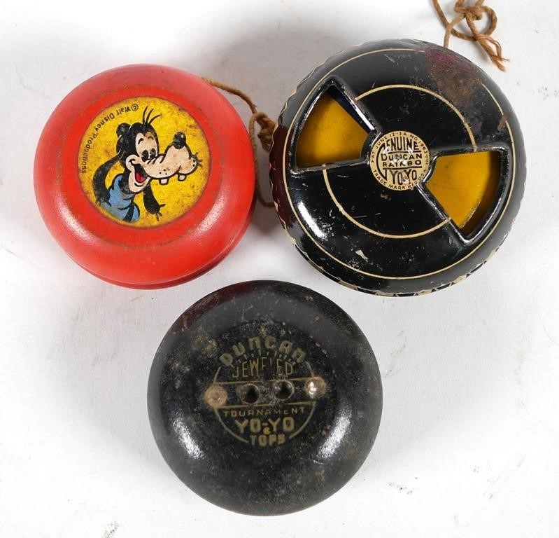 Appraisal: VINTAGE DUNCAN AND DISNEY YOYOSThree yoyos Duncan Rainbo lithographed tin