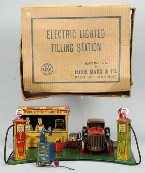 Appraisal: Marx Roadside Rest Lighted Filling Station Toy American Tin and