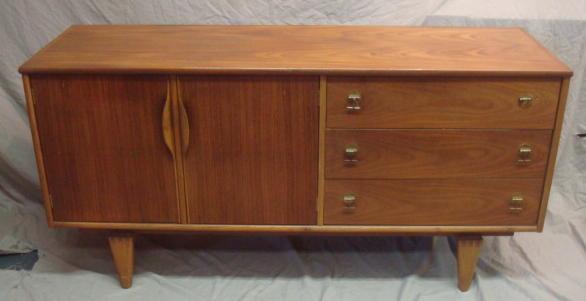 Appraisal: Danish Modern Midcentury Cabinet Raised on dovetailed legs drawer door