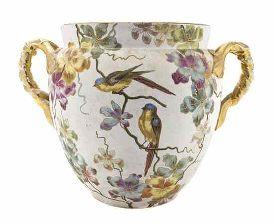 Appraisal: A German Ceramic Jardiniere of ovoid form with applied gilt