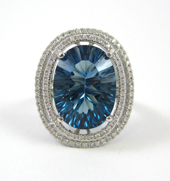 Appraisal: LONDON BLUE TOPAZ AND DIAMOND RING The k white gold