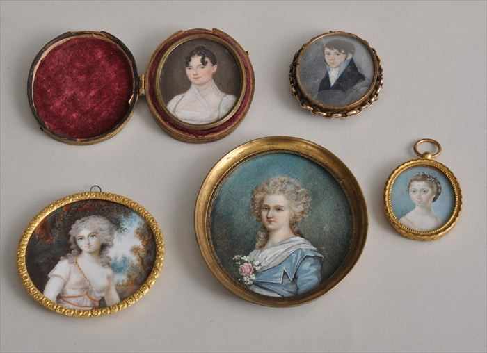 Appraisal: FOUR PORTRAIT MINIATURES IN GILT-METAL FRAMES Watercolors on ivory including