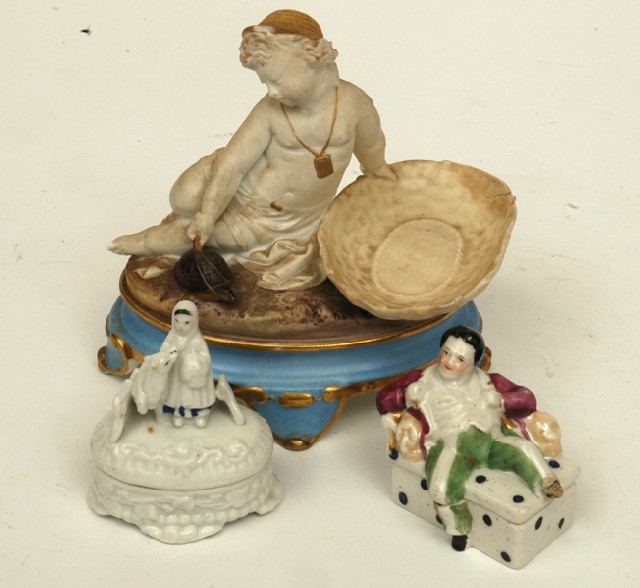 Appraisal: A CONTINENTAL PORCELAIN FIGURAL COMPORT AND TWO FAIRINGS