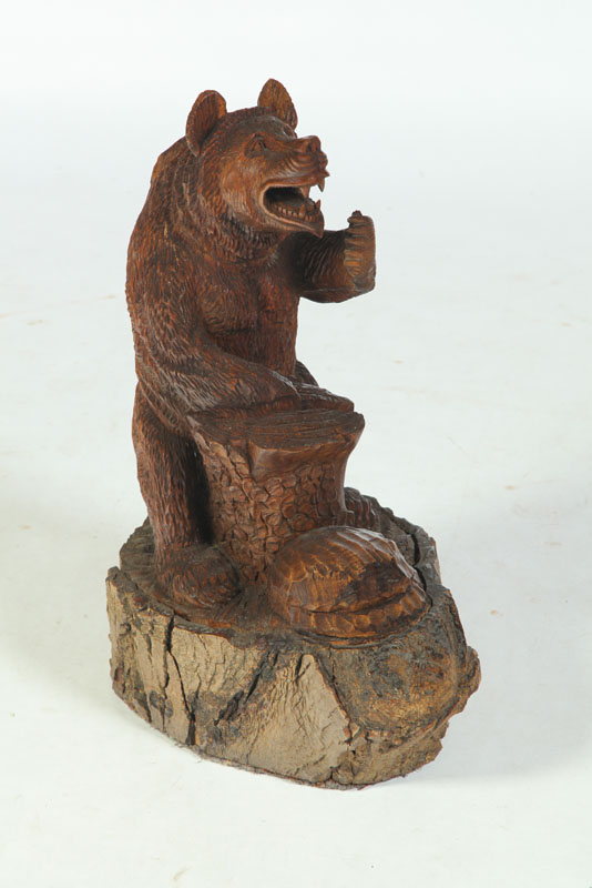 Appraisal: WOOD CARVING OF A BEAR American late th-early th century