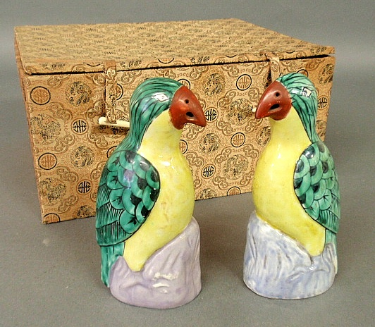 Appraisal: - Pair of colorful th c Chinese porcelain parrots in