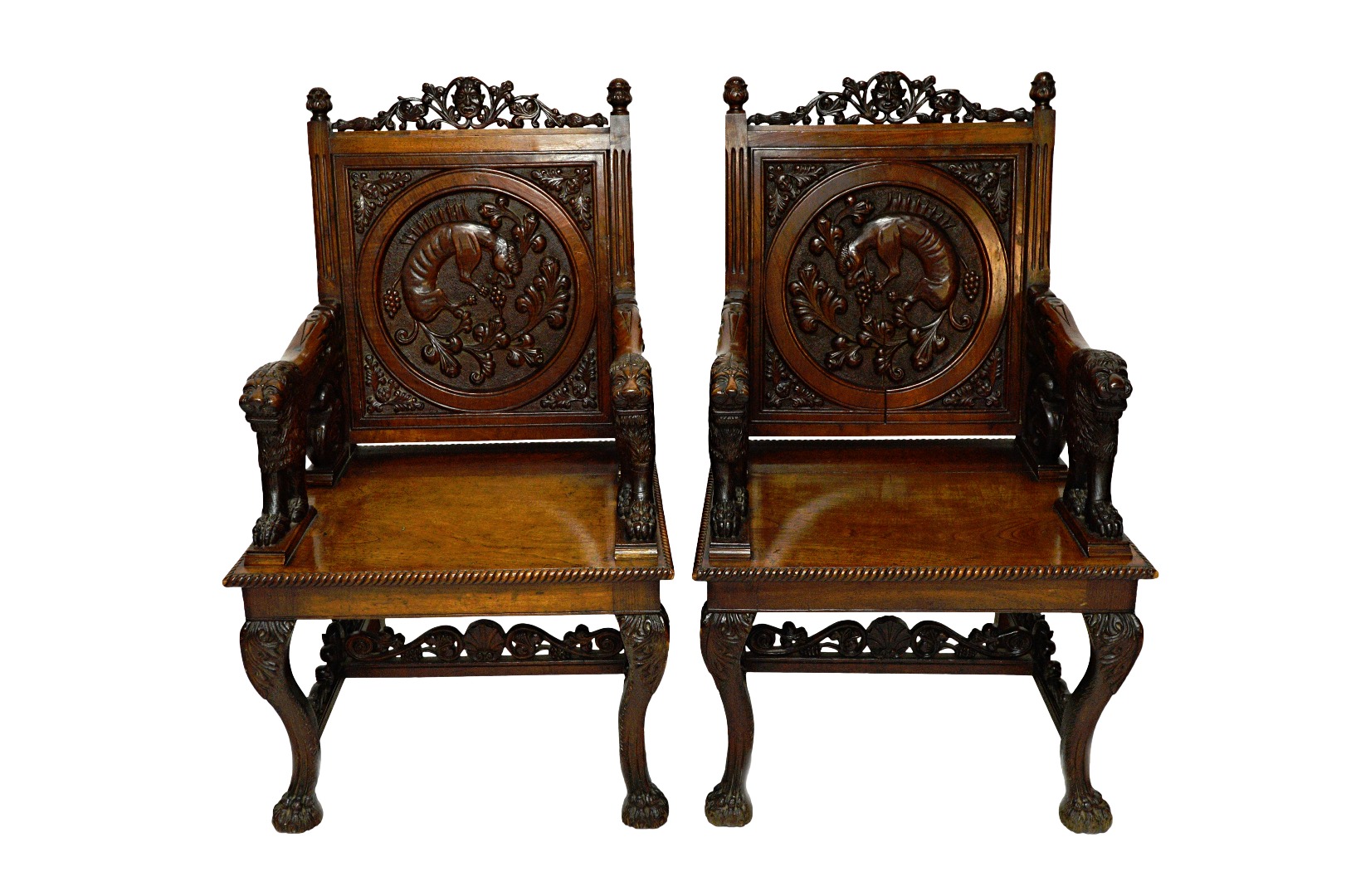 Appraisal: A pair of Anglo Indian teak armchairs circa each with