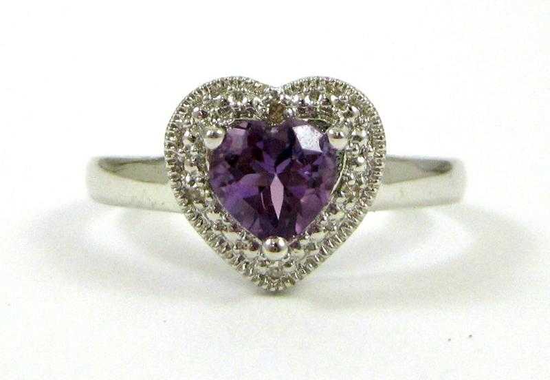 Appraisal: AMETHYST DIAMOND AND FOURTEEN KARAT GOLD RING The white gold