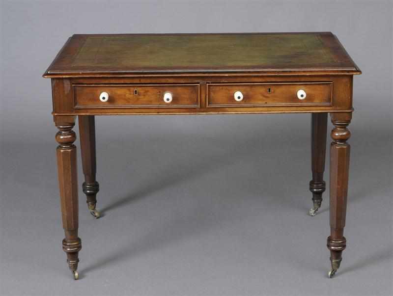 Appraisal: VICTORIAN CARVED MAHOGANY WRITING TABLE The top with tooled leather